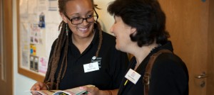Festival Director and staff member talking