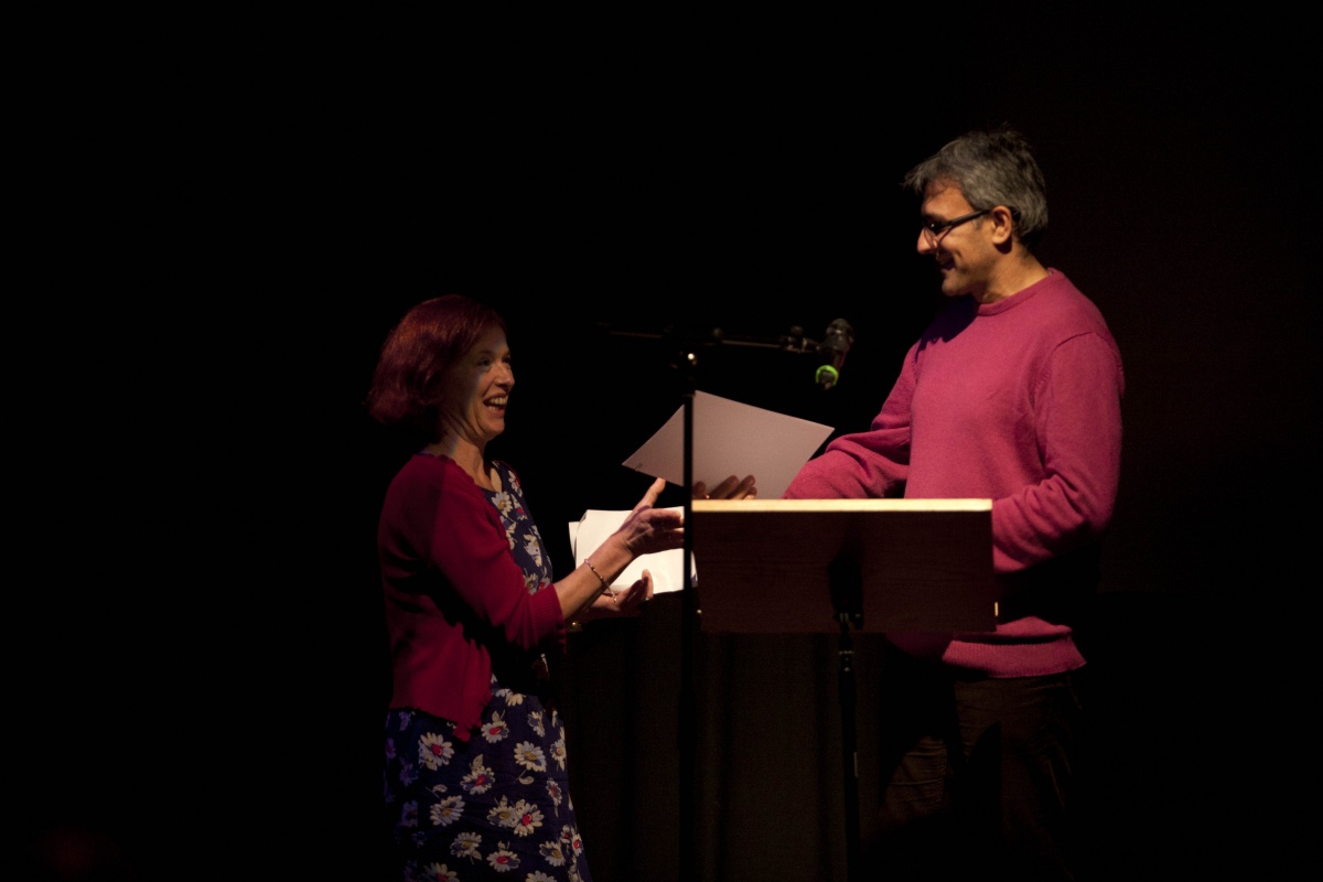 Daljit Nagra presenting prize to competition winner