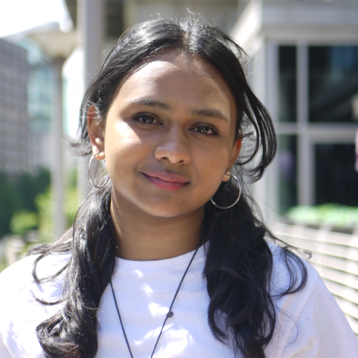 Image of a girl smiling to the camera